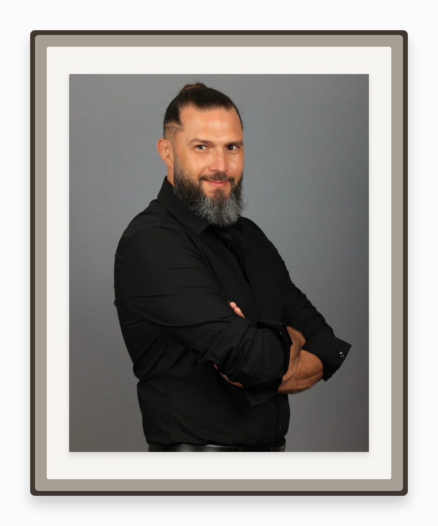 Framed portrait of Director Michael Bertt